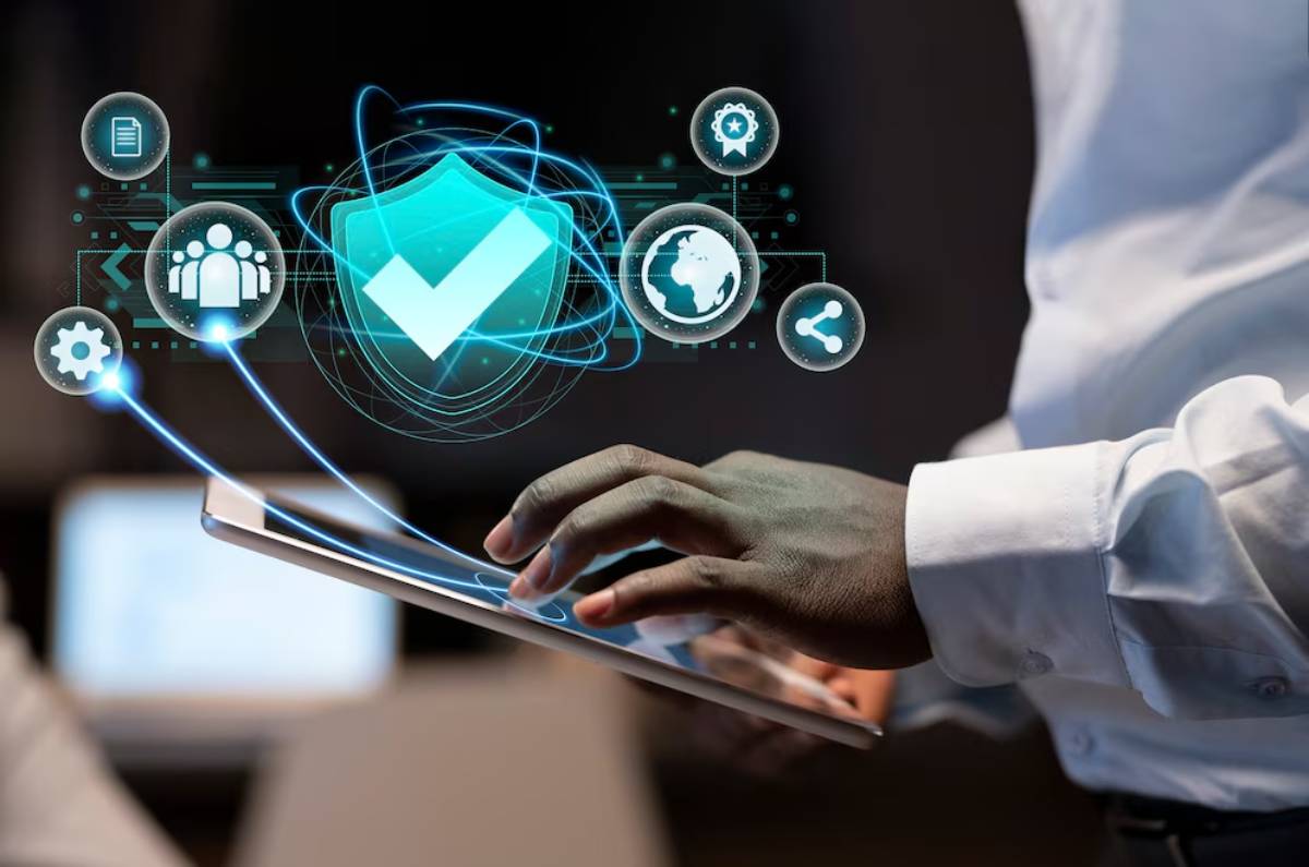 A person in a white shirt interacts with a tablet, surrounded by digital security icons and network symbols 